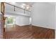 Open living room with loft and hardwood floors at 234 Hampton Shores Dr, Hampton, GA 30228