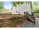 Wooden stairs leading down to the backyard at 234 Hampton Shores Dr, Hampton, GA 30228