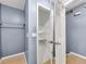 Neat and functional closet with shelving and hanging rod at 9050 Raven Dr, Jonesboro, GA 30238