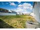 Expansive backyard featuring a well-maintained lawn and partial fences at 816 Royal Red Ct, Mcdonough, GA 30253
