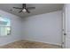 Bright bedroom with carpeted floors and ceiling fan at 816 Royal Red Ct, Mcdonough, GA 30253