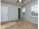 Bright bedroom with neutral walls and carpet at 816 Royal Red Ct, Mcdonough, GA 30253