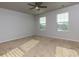 Bright bedroom with neutral walls and carpet at 816 Royal Red Ct, Mcdonough, GA 30253