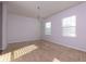 Spacious dining area with neutral walls, carpet flooring, and large windows at 816 Royal Red Ct, Mcdonough, GA 30253