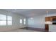 Spacious dining room with hardwood floors and access to the kitchen at 816 Royal Red Ct, Mcdonough, GA 30253