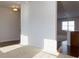 Open entryway with hardwood and carpeted floors, leading to the living and dining areas at 816 Royal Red Ct, Mcdonough, GA 30253