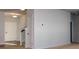 Inviting entryway with hardwood floors, staircase, and neutral-colored walls at 816 Royal Red Ct, Mcdonough, GA 30253