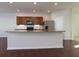 Modern kitchen with stainless steel appliances and granite countertops at 816 Royal Red Ct, Mcdonough, GA 30253