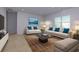 Spacious living room with light neutral walls, comfy sofas, and stylish decor at 816 Royal Red Ct, Mcdonough, GA 30253