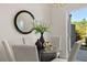 Elegant dining area with glass table, stylish chairs, and access to backyard at 237 Epping St # 89, Stockbridge, GA 30281