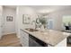 Modern kitchen with granite countertops, stainless steel appliances, and white cabinets at 237 Epping St # 89, Stockbridge, GA 30281