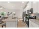 Modern kitchen featuring granite countertops and stainless steel appliances at 237 Epping St # 89, Stockbridge, GA 30281