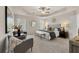 Main bedroom with sitting area and modern decor at 237 Epping St # 89, Stockbridge, GA 30281