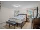 Spacious bedroom with large bed, window, and neutral decor at 450 Little Creek Rd, Lawrenceville, GA 30045