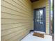 Back door entrance with a small patio at 4505 Ravenwood Dr, Union City, GA 30291