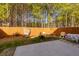 Private backyard with a wooden fence and patio at 4505 Ravenwood Dr, Union City, GA 30291