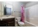 Clean bathroom with shower/tub combo and granite vanity at 4505 Ravenwood Dr, Union City, GA 30291