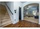 Entryway with staircase and view into living room at 4505 Ravenwood Dr, Union City, GA 30291