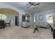 Living room with light beige couch and carpet at 4505 Ravenwood Dr, Union City, GA 30291