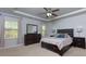 Spacious main bedroom with a large bed and plenty of closet space at 4505 Ravenwood Dr, Union City, GA 30291