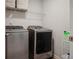 Convenient laundry room with washer and dryer hookups at 824 Lakehaven Ln, Loganville, GA 30052