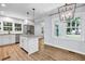 Eat-in kitchen with an island and updated flooring at 1003 Springdale Dr, Marietta, GA 30062