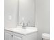 Simple bathroom with white vanity and toilet at 406 River Chase Dr, Jonesboro, GA 30238