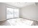 Dining area with sliding glass doors and wood-look tile floors at 406 River Chase Dr, Jonesboro, GA 30238