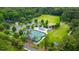 Aerial view of community park with tennis courts and playground at 704 Fairgate Rd, Marietta, GA 30064