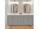 Bathroom with double vanity and grey cabinets at 704 Fairgate Rd, Marietta, GA 30064