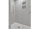 Modern walk-in shower with grey tile at 704 Fairgate Rd, Marietta, GA 30064