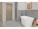 Bathroom with soaking tub and walk-in shower at 704 Fairgate Rd, Marietta, GA 30064
