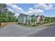 Townhome community showcasing street view and landscaping at 704 Fairgate Rd, Marietta, GA 30064
