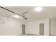 Garage interior with extra storage and door at 704 Fairgate Rd, Marietta, GA 30064