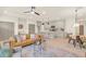 Open concept living space with a leather couch and adjacent kitchen at 704 Fairgate Rd, Marietta, GA 30064
