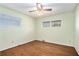 Simple bedroom with hardwood floors and neutral walls at 2118 Rosser Pl, Stone Mountain, GA 30087