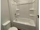 Clean bathroom with a bathtub, shower, and toilet at 4048 Annsbury Ct, Lilburn, GA 30047