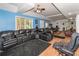 Large basement recreation area with sectional sofa and pool table at 2080 Misty Oaks Dr, Buford, GA 30519