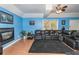 Spacious basement with sectional sofa and fireplace at 2080 Misty Oaks Dr, Buford, GA 30519