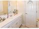 Bathroom with a single vanity and a mirror at 2080 Misty Oaks Dr, Buford, GA 30519