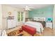 Bright bedroom with a queen bed and sitting area at 2080 Misty Oaks Dr, Buford, GA 30519