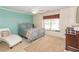 Bedroom with a full-size bed and a sitting area at 2080 Misty Oaks Dr, Buford, GA 30519