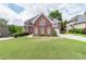 Two story house with a large front yard at 2080 Misty Oaks Dr, Buford, GA 30519