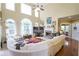 Two story Gathering room with sectional sofa and fireplace at 2080 Misty Oaks Dr, Buford, GA 30519