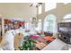Large Gathering room with sectional sofa and kitchen view at 2080 Misty Oaks Dr, Buford, GA 30519