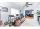 Bright home office with large windows and built-in shelving at 2080 Misty Oaks Dr, Buford, GA 30519