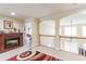 Upstairs hall with fireplace and view of bedroom at 2080 Misty Oaks Dr, Buford, GA 30519