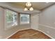 Cozy dining area with wood floors, natural lighting, and neutral wall color at 3337 Devaughn Ne Dr, Marietta, GA 30066
