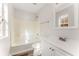Clean bathroom showcasing a tub-shower combo, vanity with sink, and modern fixtures at 5845 Hampton Ct, Atlanta, GA 30349