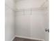 Walk-in closet with built-in shelving, providing ample storage space at 5845 Hampton Ct, Atlanta, GA 30349